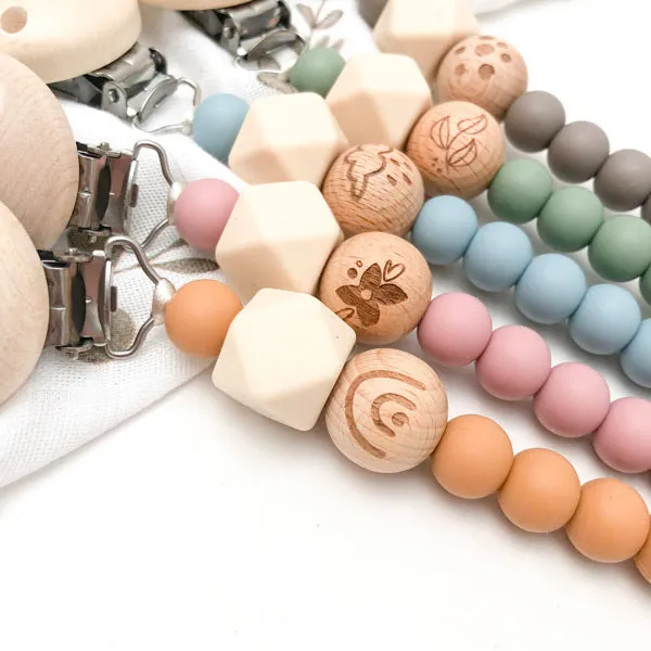 One.Chew.Three Silicone Dummy Holder Clip - Elements