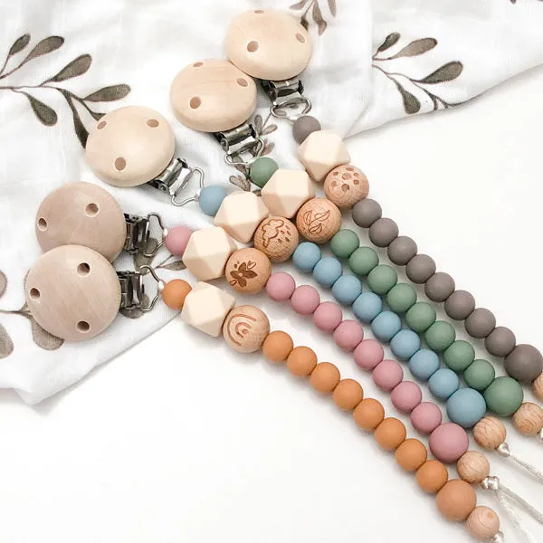 One.Chew.Three Silicone Dummy Holder Clip - Elements