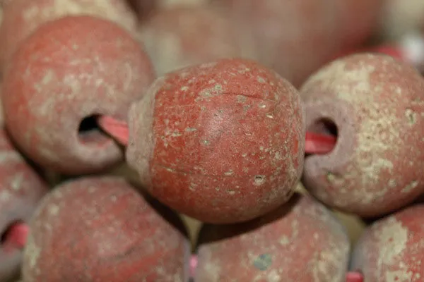 Strand of Medium Brick Red Majapahit Beads
