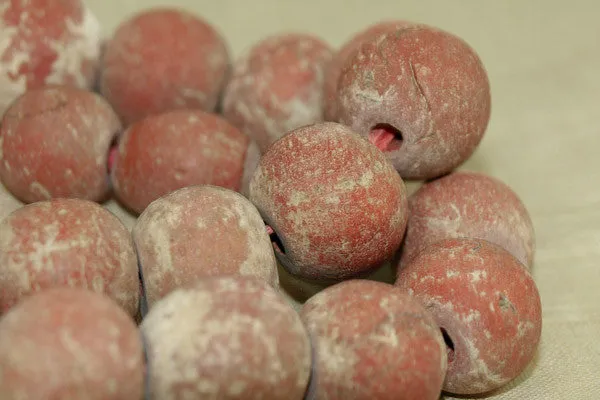Strand of Medium Brick Red Majapahit Beads