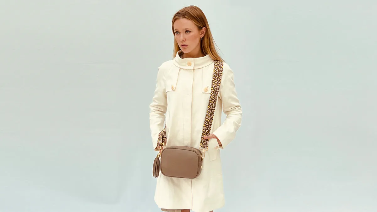 The Tassel Latte Leather Crossbody Bag With Lemon Cheetah Strap