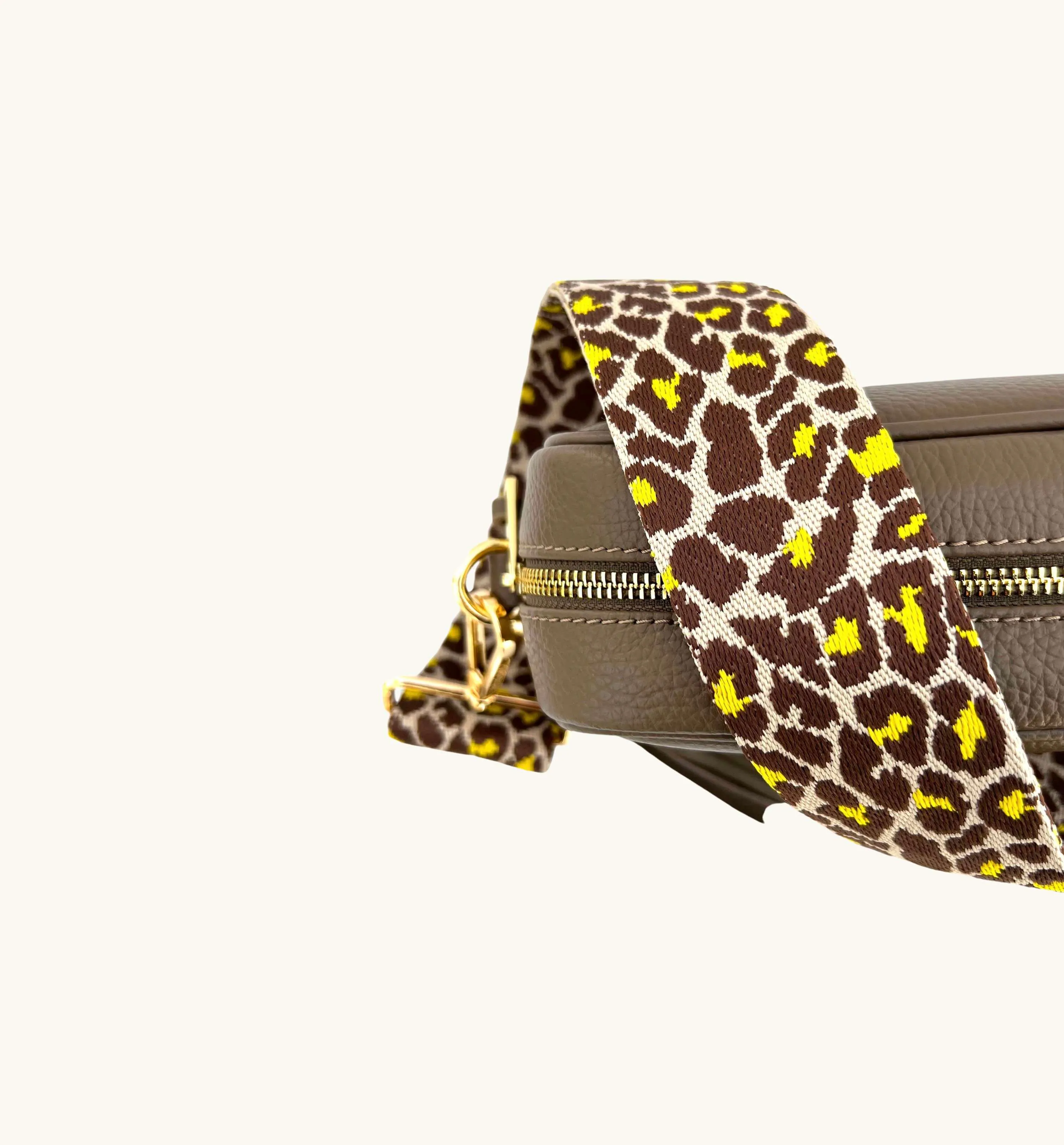 The Tassel Latte Leather Crossbody Bag With Lemon Cheetah Strap