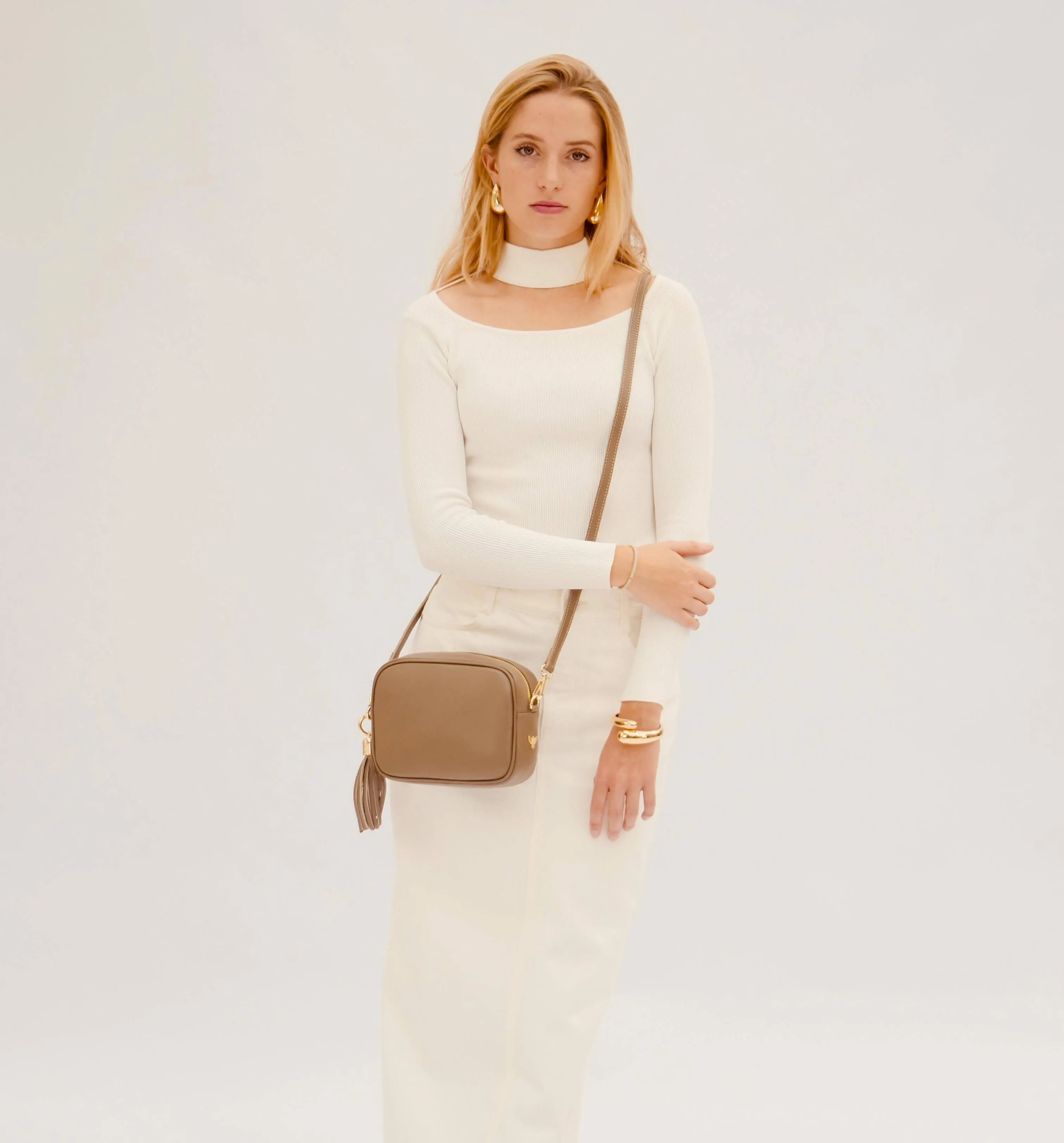 The Tassel Latte Leather Crossbody Bag With Lemon Cheetah Strap