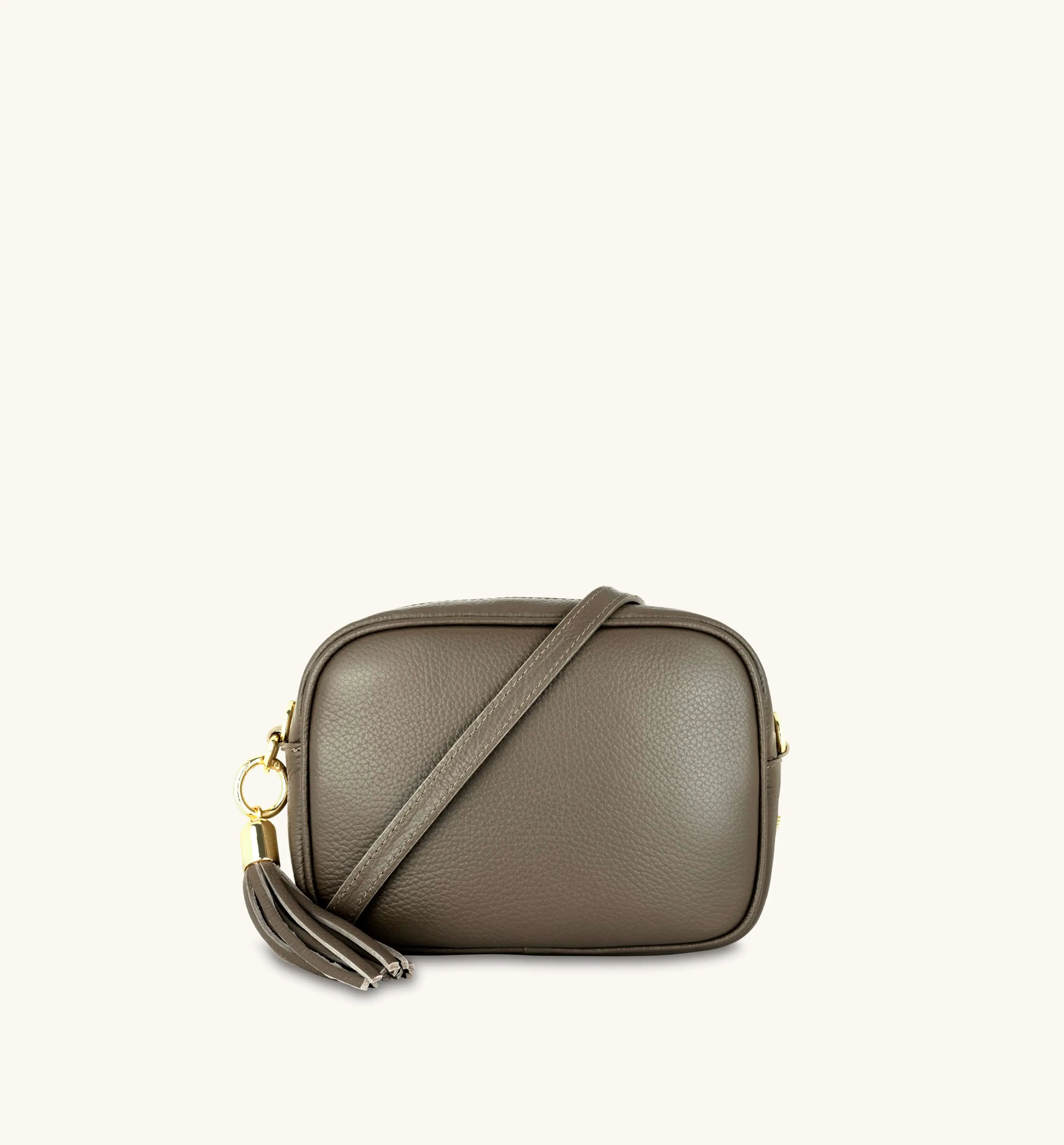 The Tassel Latte Leather Crossbody Bag With Lemon Cheetah Strap
